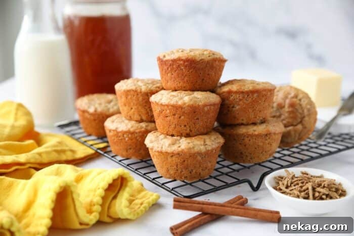 Wholesome Bran Muffins 10 All Bran Muffins stacked on a wire cooling rack.