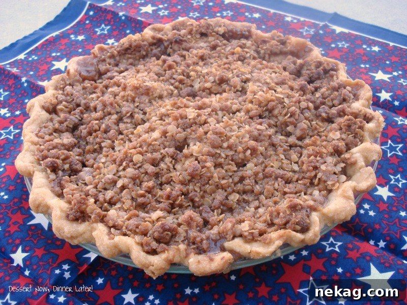 Decadent Dutch Apple Cream Pie 4 A freshly baked Dutch Apple Cream Pie cooling on a wire rack.