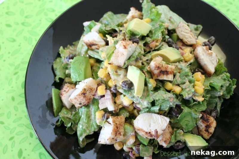 Smoky Chipotle Chicken Taco Bowl 3 Chipotle Chicken Taco Salad close up with creamy avocado and sweet corn