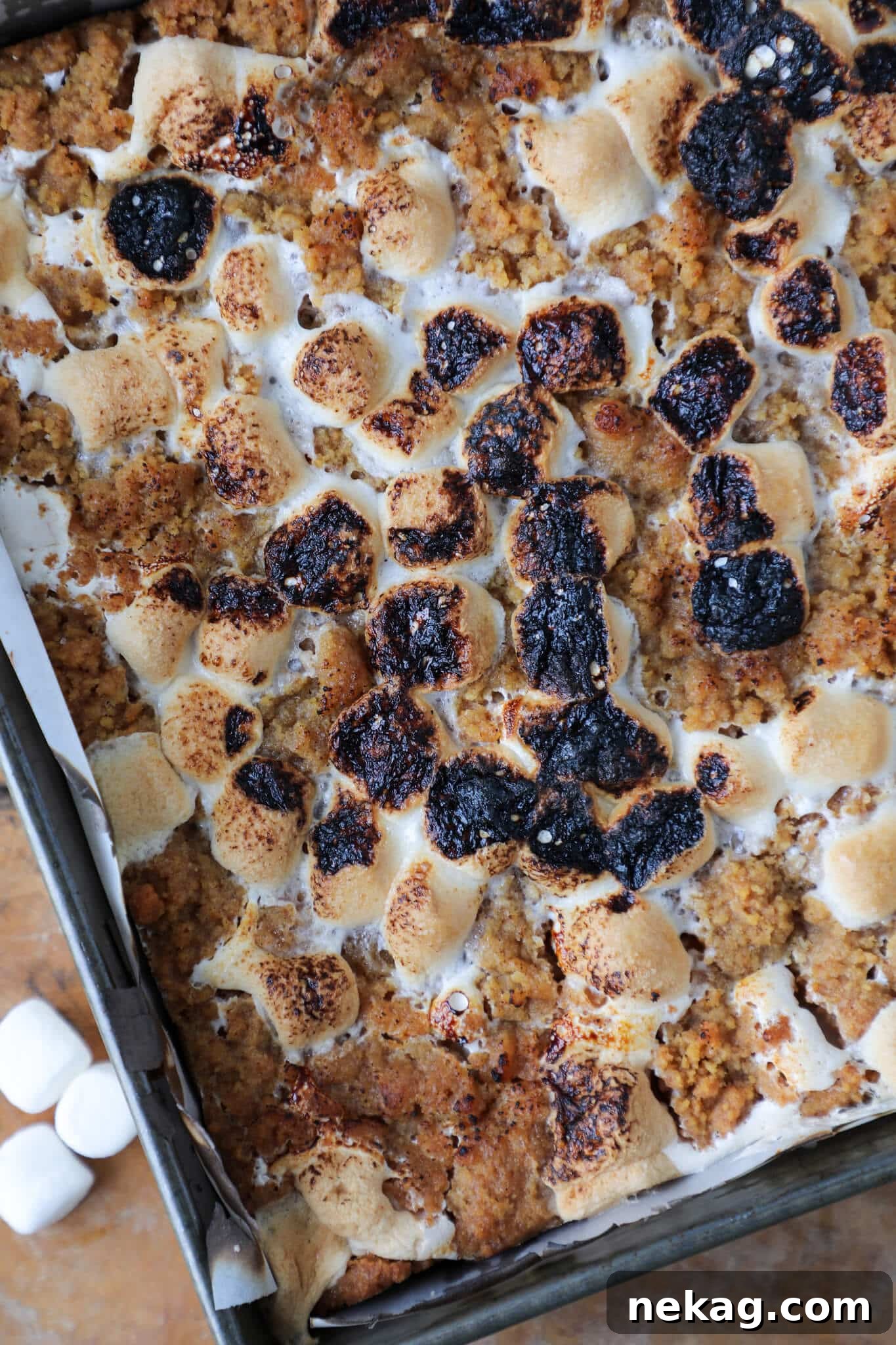 Uncut pan of Soft Chewy S'mores Crumble Bars fresh from the oven