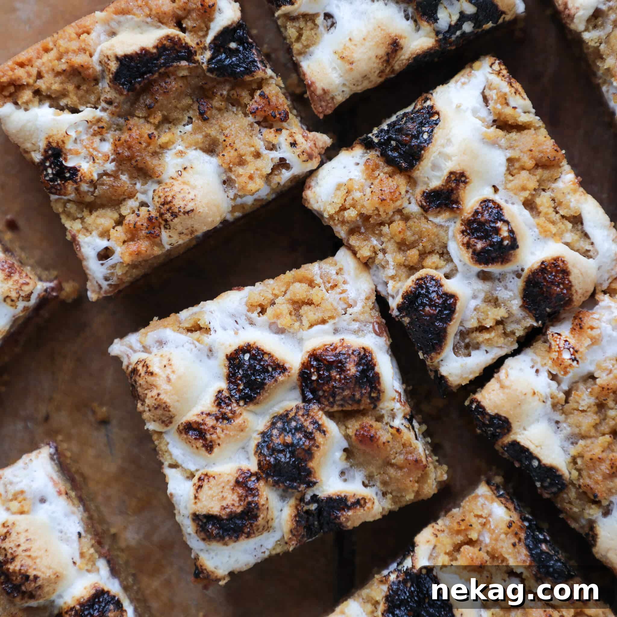 Detailed top view of Soft Chewy S'mores Crumble Bars with toasted marshmallows