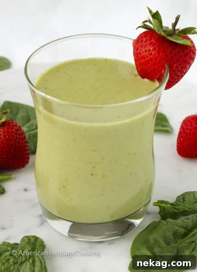Strawberry Banana Green Power Smoothie 5 Close-up of the creamy Strawberry Banana Spinach Smoothie in a glass