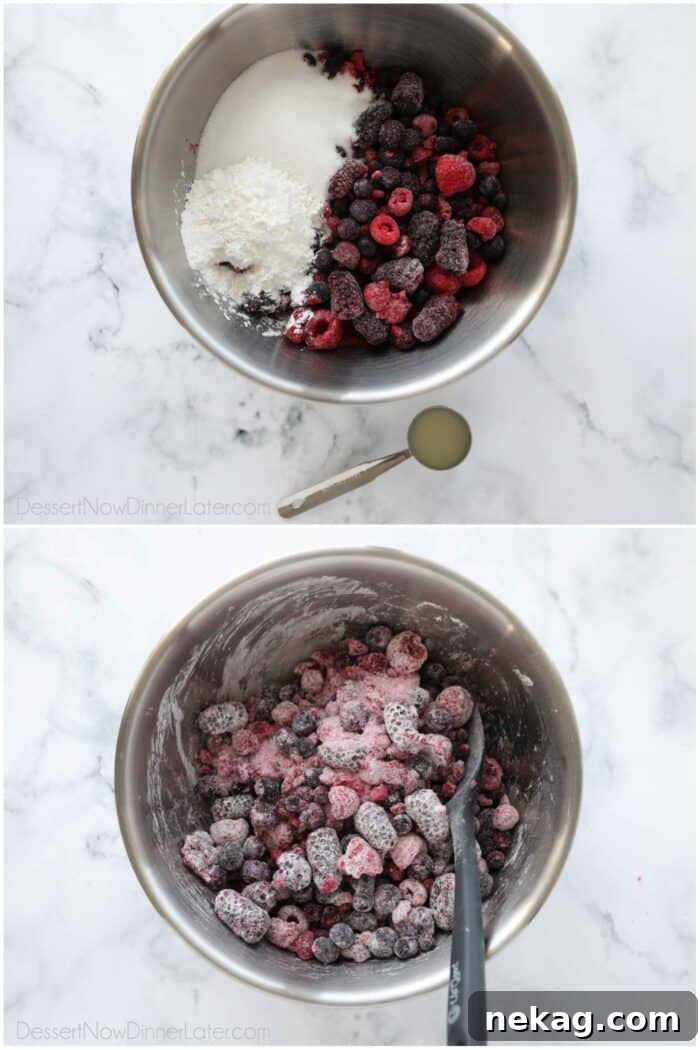 A large mixing bowl containing frozen berries, sugar, cornstarch, and lemon juice, ready to be stirred for the berry filling.
