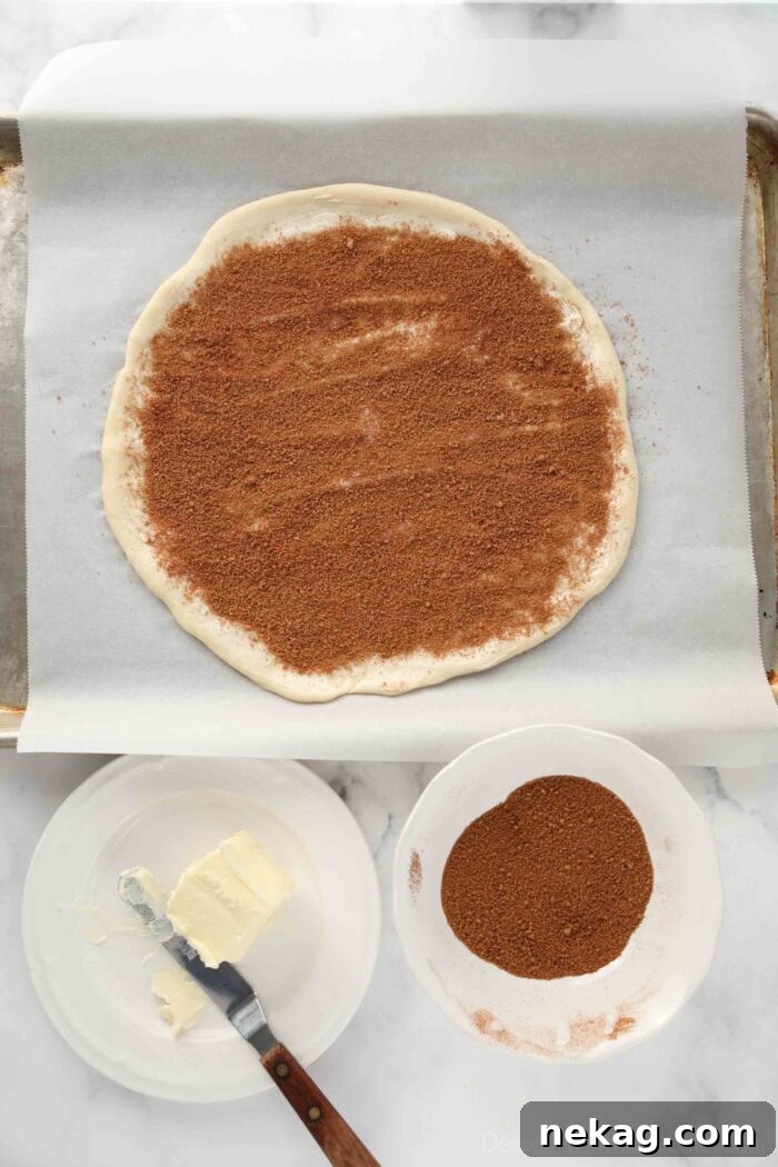 Cinnamon Swirl Star Bread 6 A visual step-by-step of assembling the cinnamon star bread with Rhodes rolls. It shows butter being spread on a dough circle, followed by a layer of cinnamon-sugar.