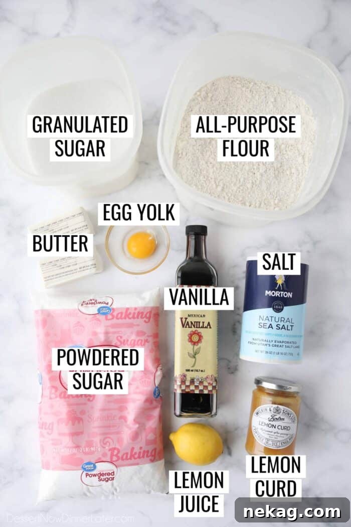 Tangy Lemon Delights 4 A selection of meticulously labeled ingredients laid out on a clean surface, ready to be transformed into delicious Lemon Curd Cookies. Essential items such as butter, sugar, flour, lemon curd, and a lemon are clearly visible, highlighting the simplicity and freshness of the recipe.