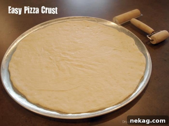 Simple Homemade Pizza Base 2 Perfectly baked, thin and crispy easy pizza crust cooling on a wire rack.