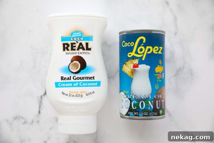 Two brands of cream of coconut. Coco Real in a bottle and Coco Lopez in a can.