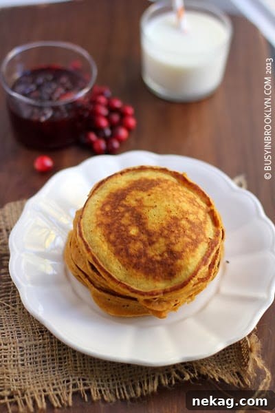 Pumpkin Ricotta Pancakes with Cranberry Syrup for breakfast