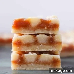 Stacked Salted Caramel Butter Bars, highlighting their luscious layers.