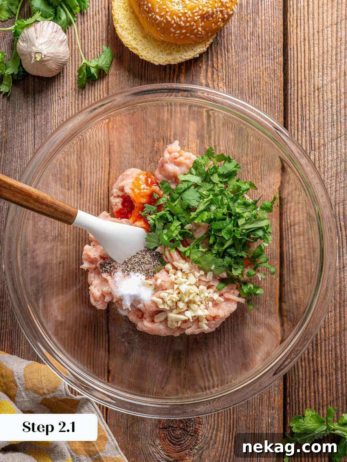 Ultimate Chicken Burgers 5 chicken burger ingredients in a bowl, ready to be mixed.