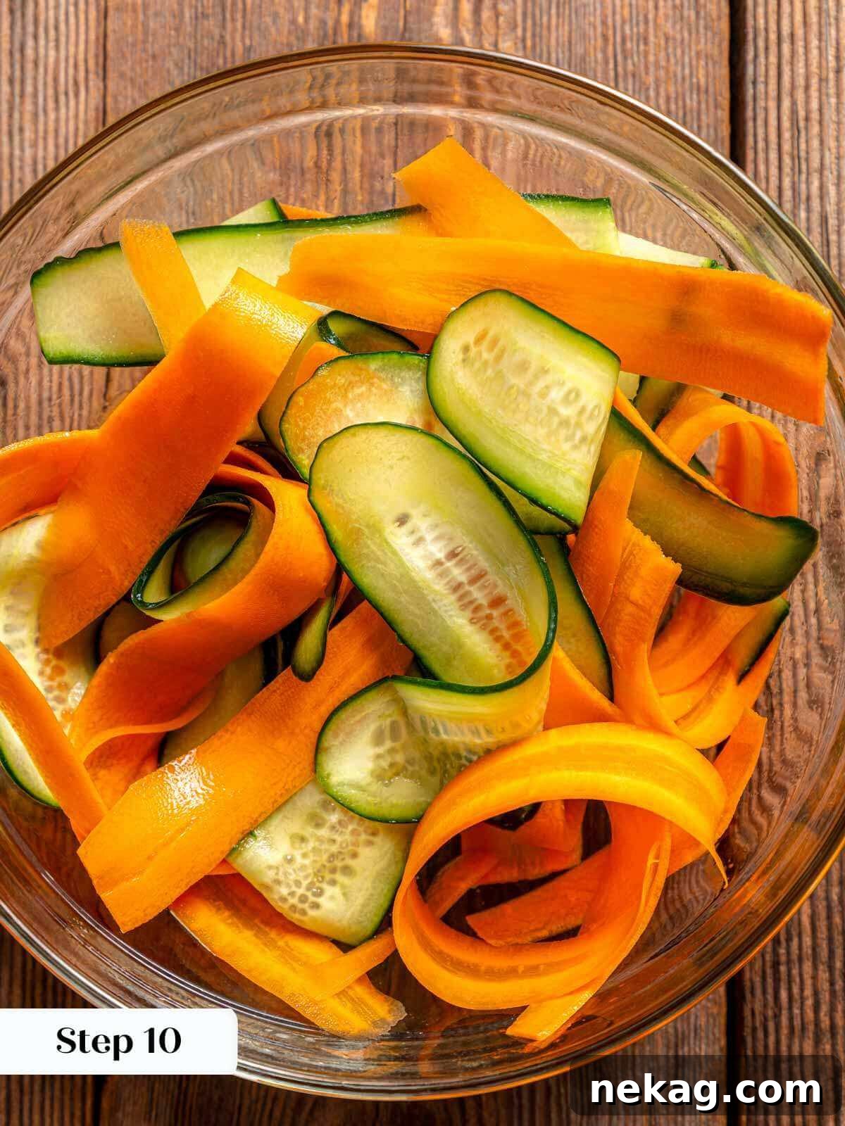 Ultimate Chicken Burgers 8 vibrant pickled carrot and cucumber ribbons in a bowl.