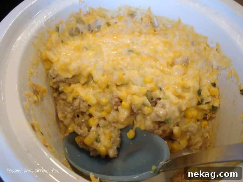 Baked Tater Tot Casserole topped with golden cheese