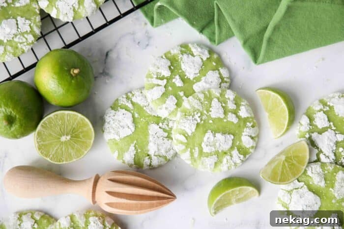 Tangy Lime Crinkle Clouds 9 Crinkle-style lime cookies with powdered sugar.