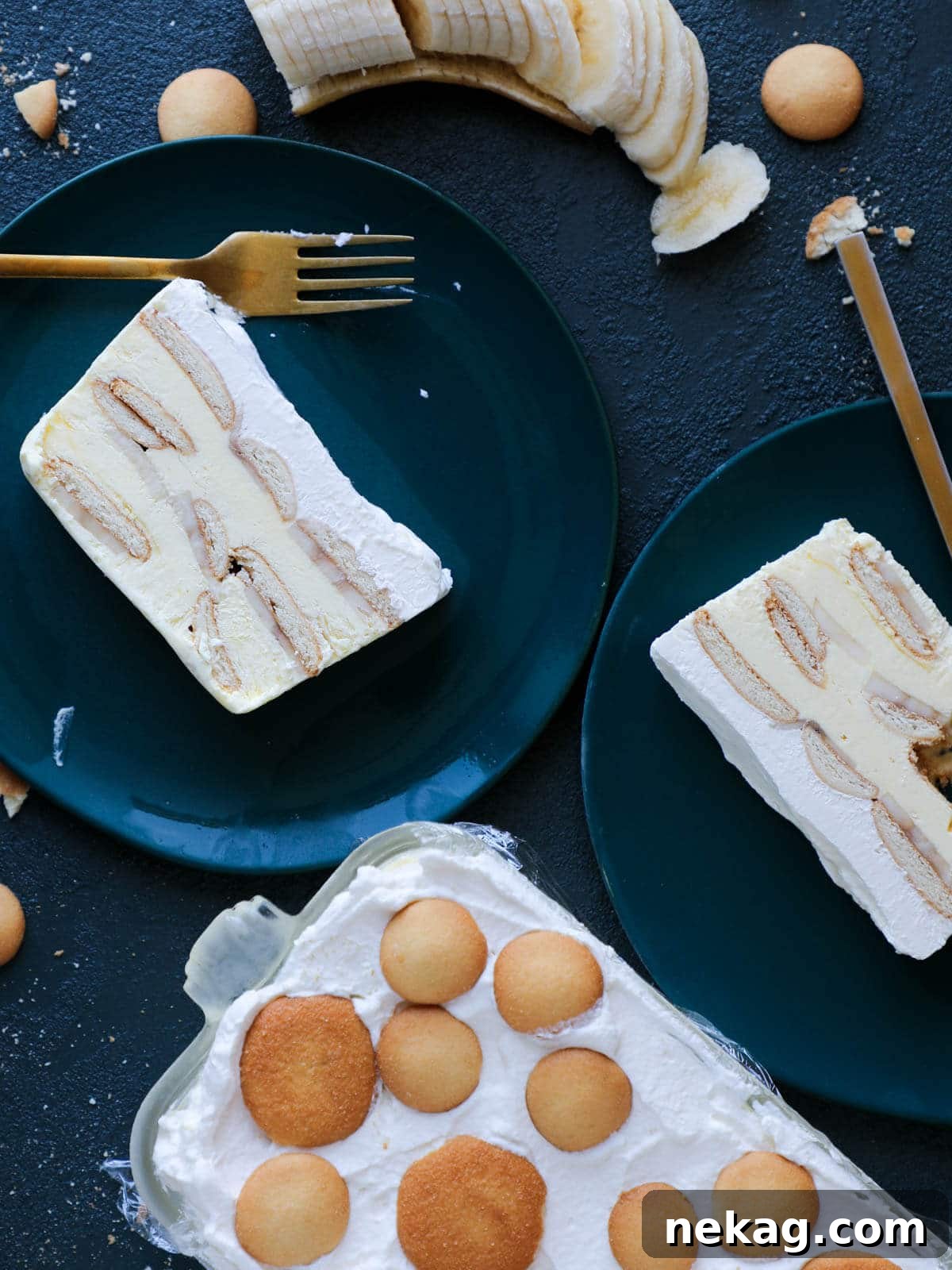 A vibrant slice of banana pudding ice box cake on teal plates, ready to be enjoyed as an easy summer dessert.