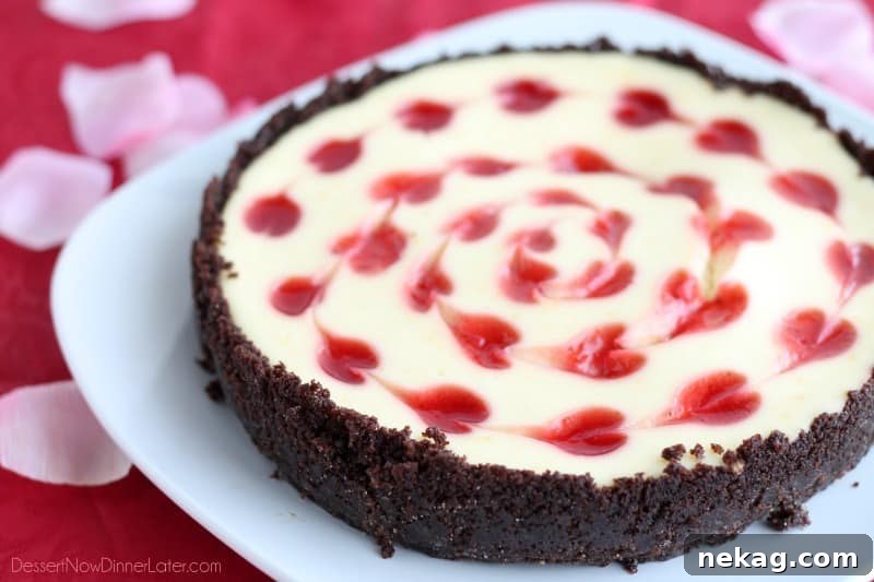 Velvet Heart Cheesecake 8 A beautifully baked Valentine's Day cheesecake with strawberry heart designs.