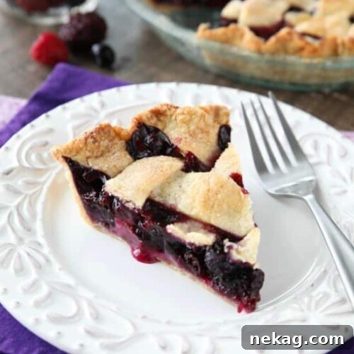 Perfect Frozen Mixed Berry Pie Video Tutorial 2 A tempting image of the finished Frozen Mixed Berry Pie, ready to be enjoyed.