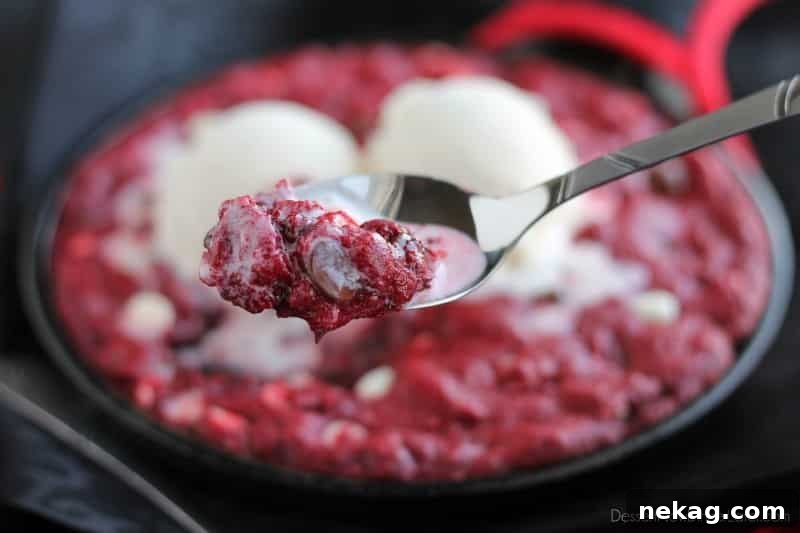 Decadent Red Velvet Skillet Cookie 4 Red Velvet Pizookie dough in a skillet before baking