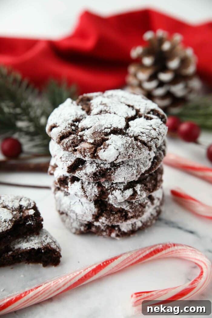 Cool Mint Chocolate Crinkle Cookies 2 Stack of chocolate peppermint crinkle cookies made with cake mix.