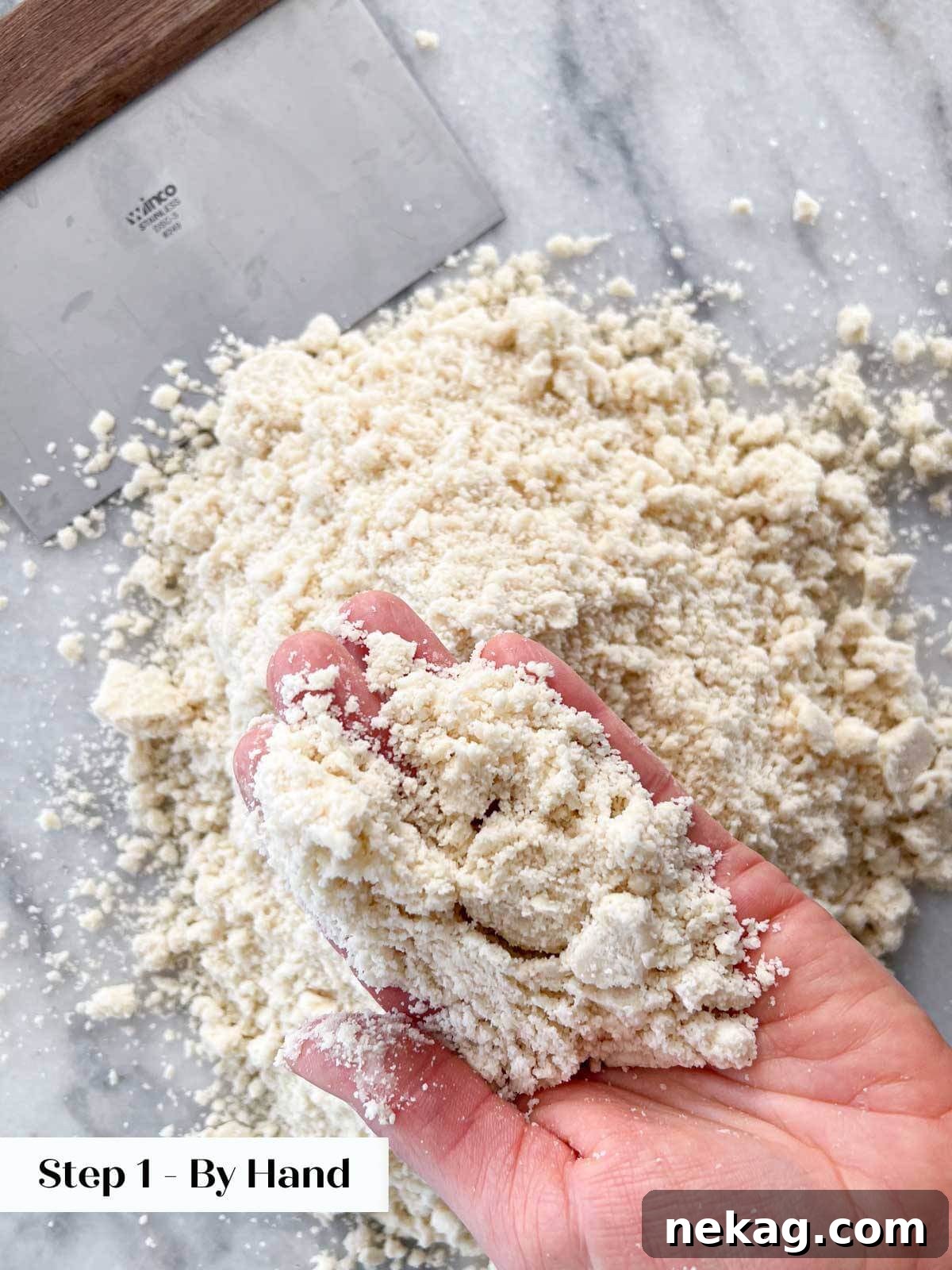 Flaky Crisco Pie Crust Recipe 6 Shortening perfectly cut into flour mixture by hand, showing a coarse crumb texture.