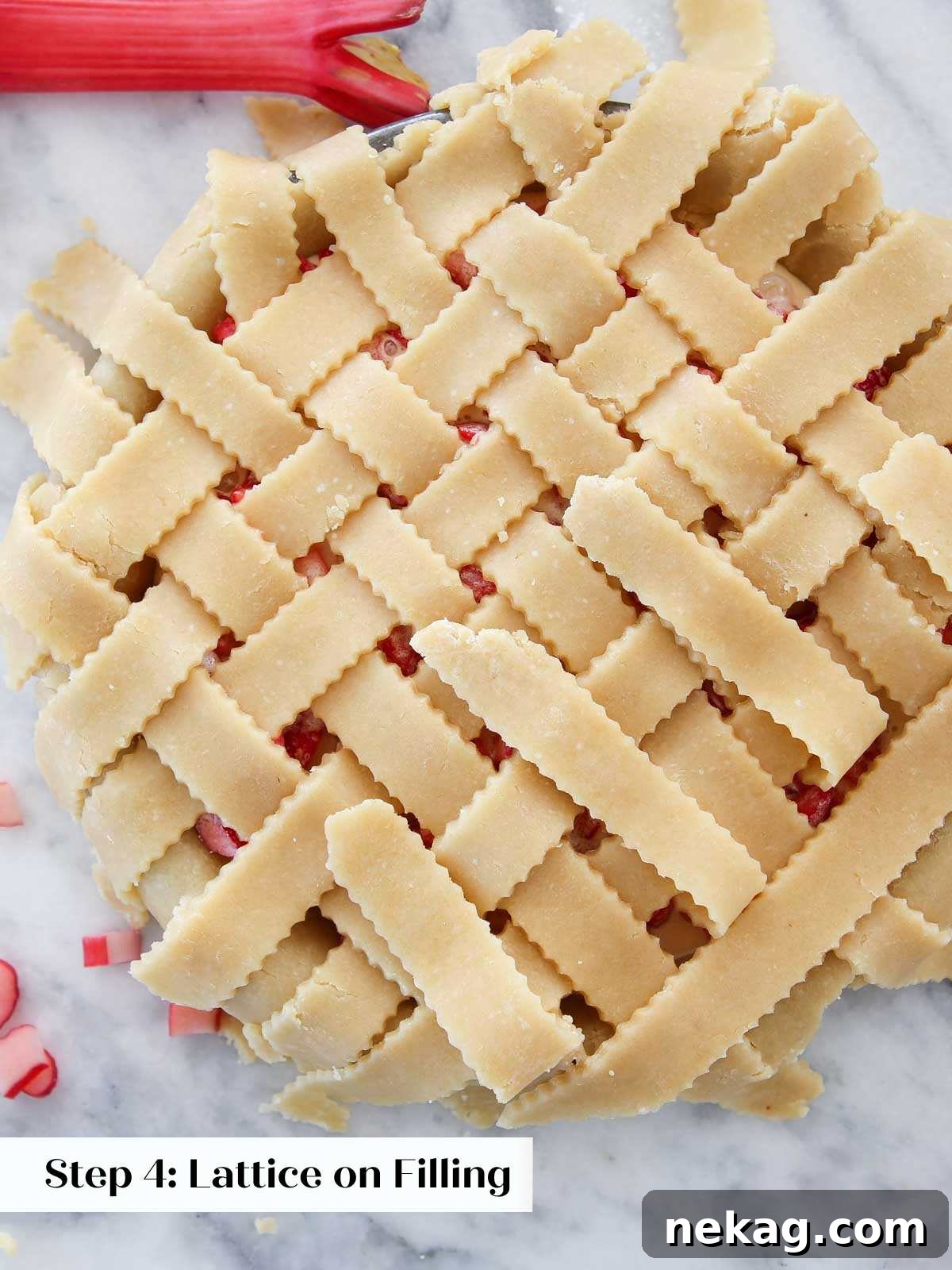Weaving a Perfect Pie Crust Lattice 7 latticing pie dough on assembled pie.
