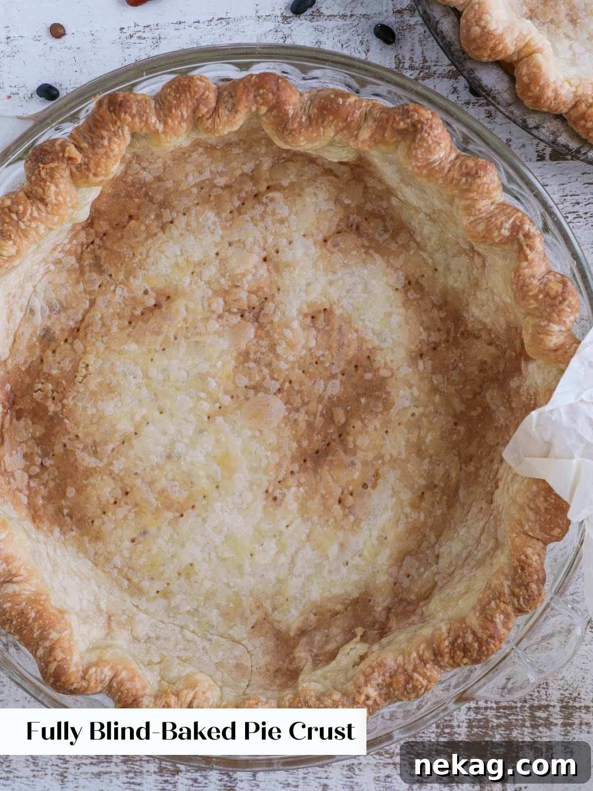 Mastering Blind Baking for a Perfect Pie Crust 11 A fully blind baked pie crust, golden brown and perfectly cooked.