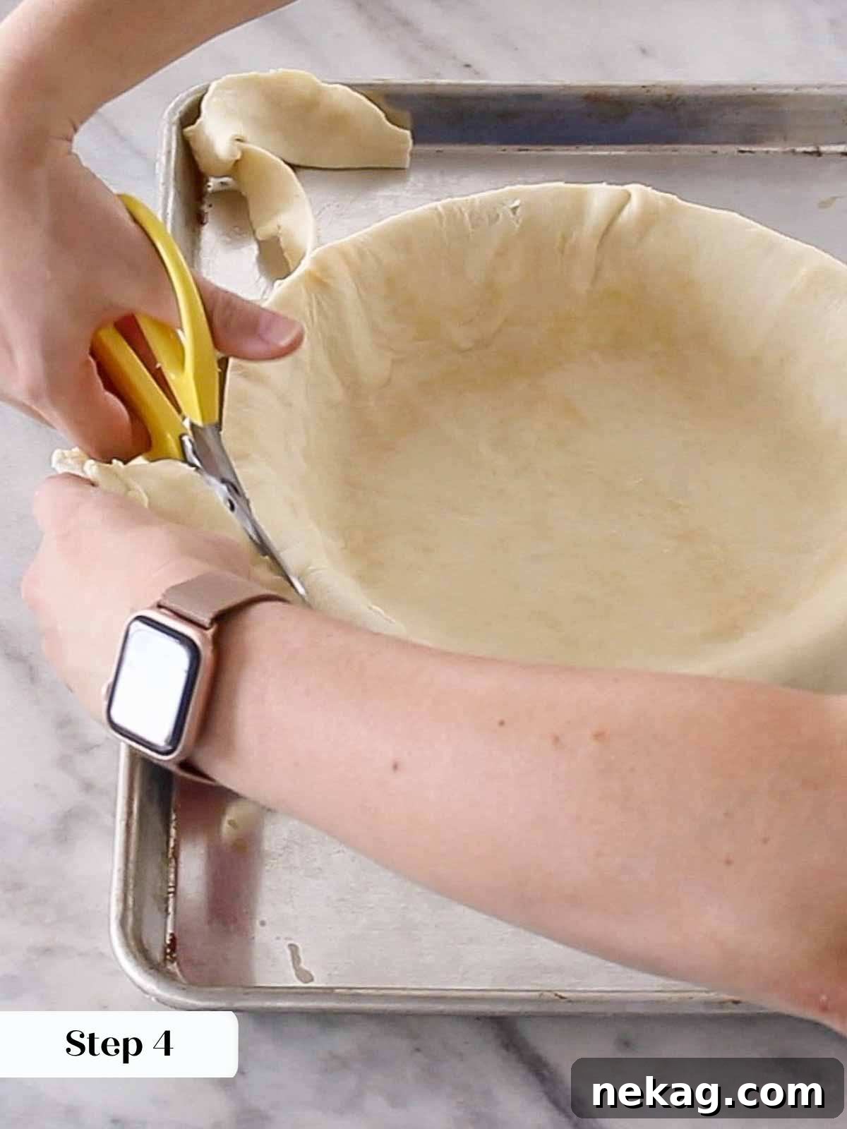 Mastering Blind Baking for a Perfect Pie Crust 6 Using kitchen scissors to trim excess pie dough from around the edge of a pie plate.