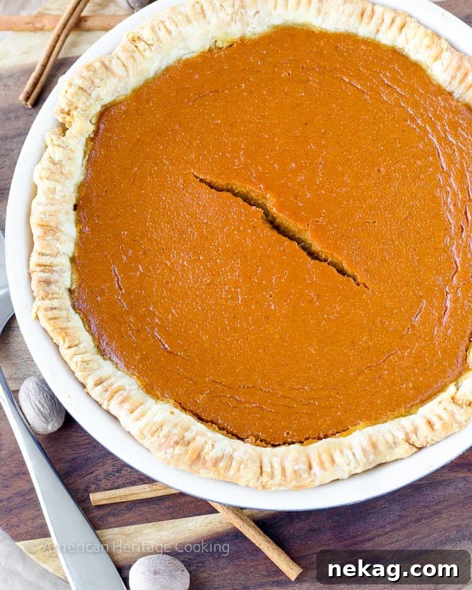 Elevated Pumpkin Pie Classic 4 Ingredients for Classic Pumpkin Pie with a Twist laid out, including pumpkin puree, spices, lemon, and brown sugar.
