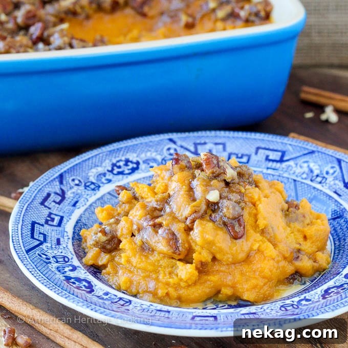 Smart Sweet Potato Casserole 4 A serving of lightened sweet potato casserole on a plate, ready for a holiday meal