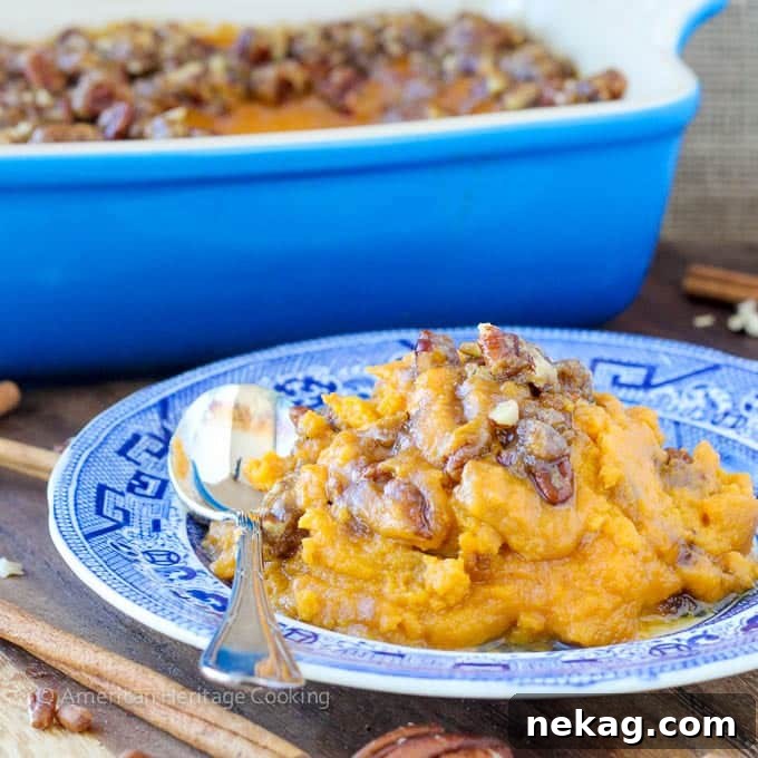 Smart Sweet Potato Casserole 7 A close-up of the lightened sweet potato casserole in a baking dish, ready to be served