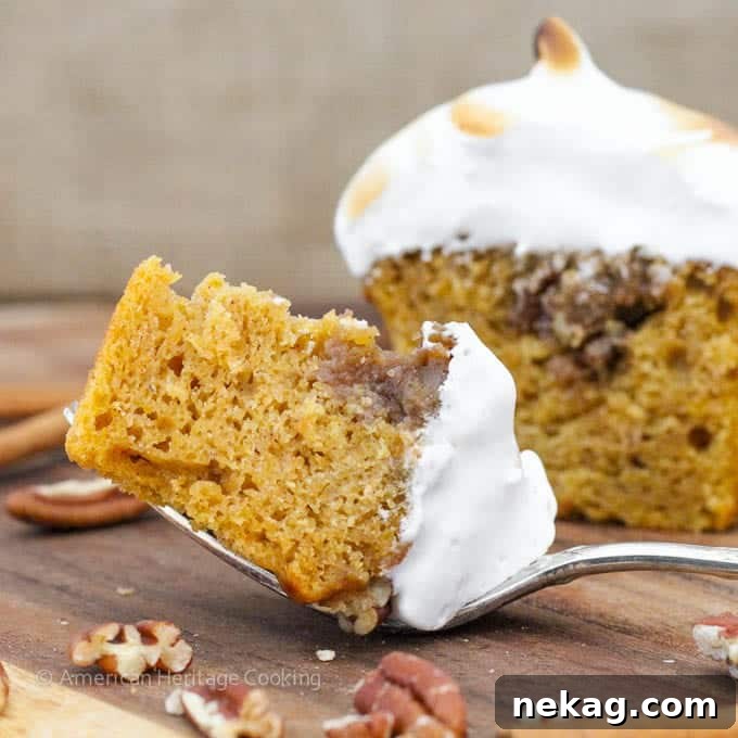 Close-up of a Sweet Potato Casserole Cupcake with gooey marshmallow frosting