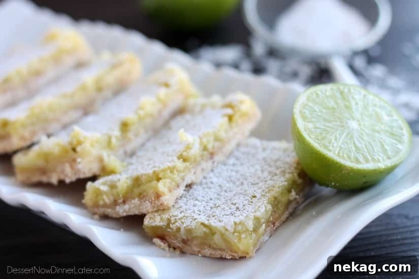 Zesty Coconut-Lime Dream Bars 3 Close-up shot of Coconut Key Lime Bars, showcasing their vibrant green filling and golden-brown crust
