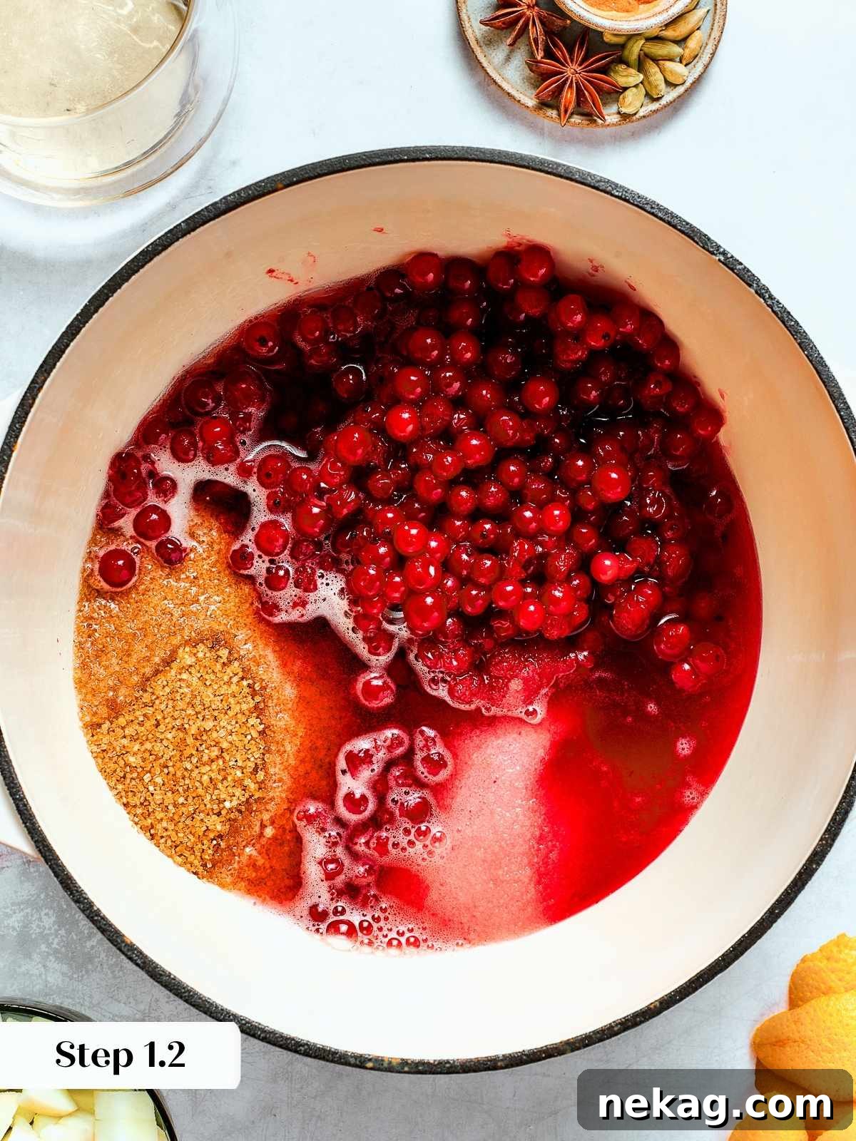 Ruby Red Holiday Delight 7 Fresh cranberries, sugar, and natural apple cider gently bubbling together in a saucepan, beginning to release their fragrant spiced aromas.