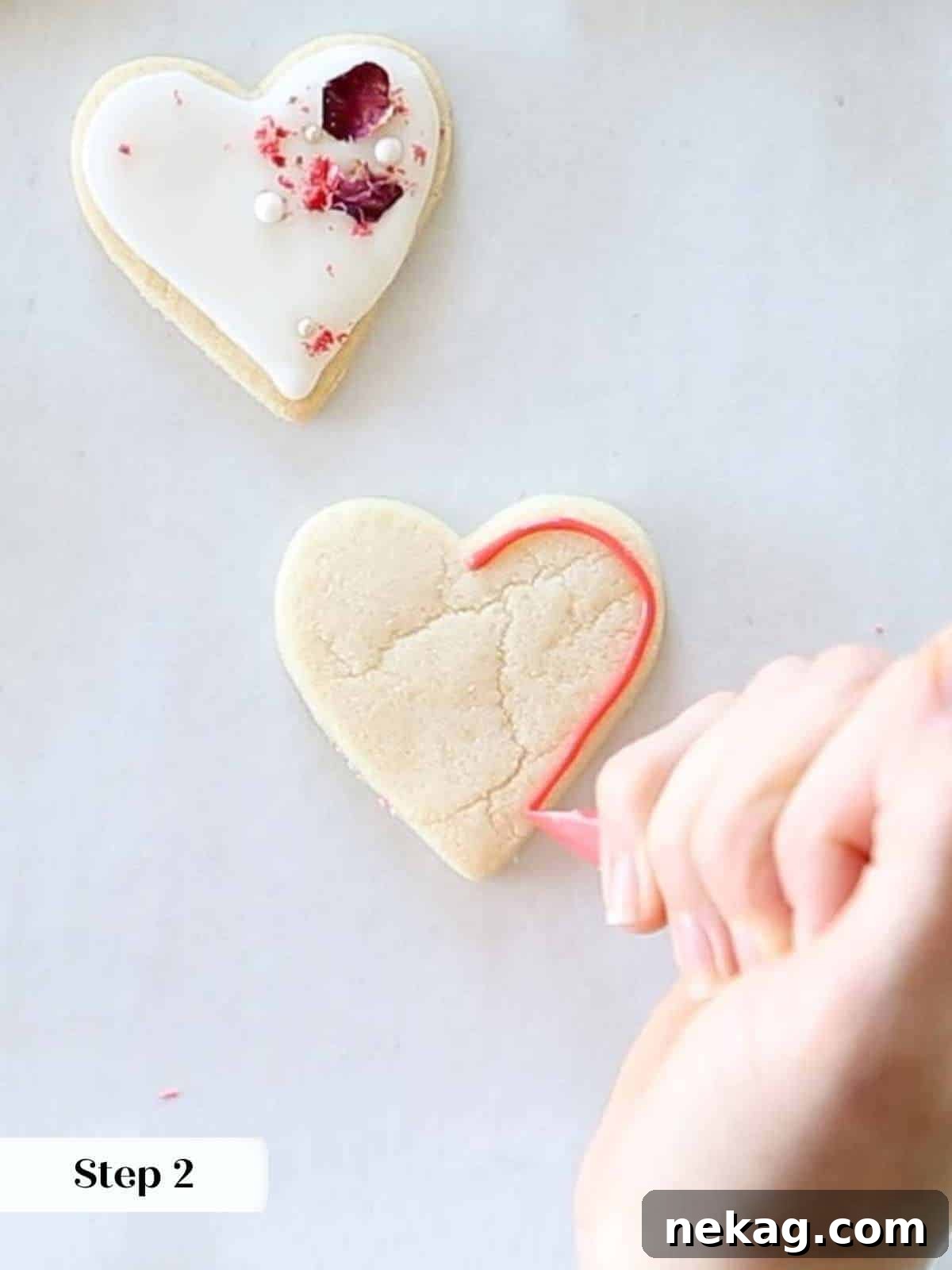Sweetheart's Delight Cookies 11 A decorator meticulously outlining a heart-shaped sugar cookie with red royal icing using a piping bag, creating the base for flooding.