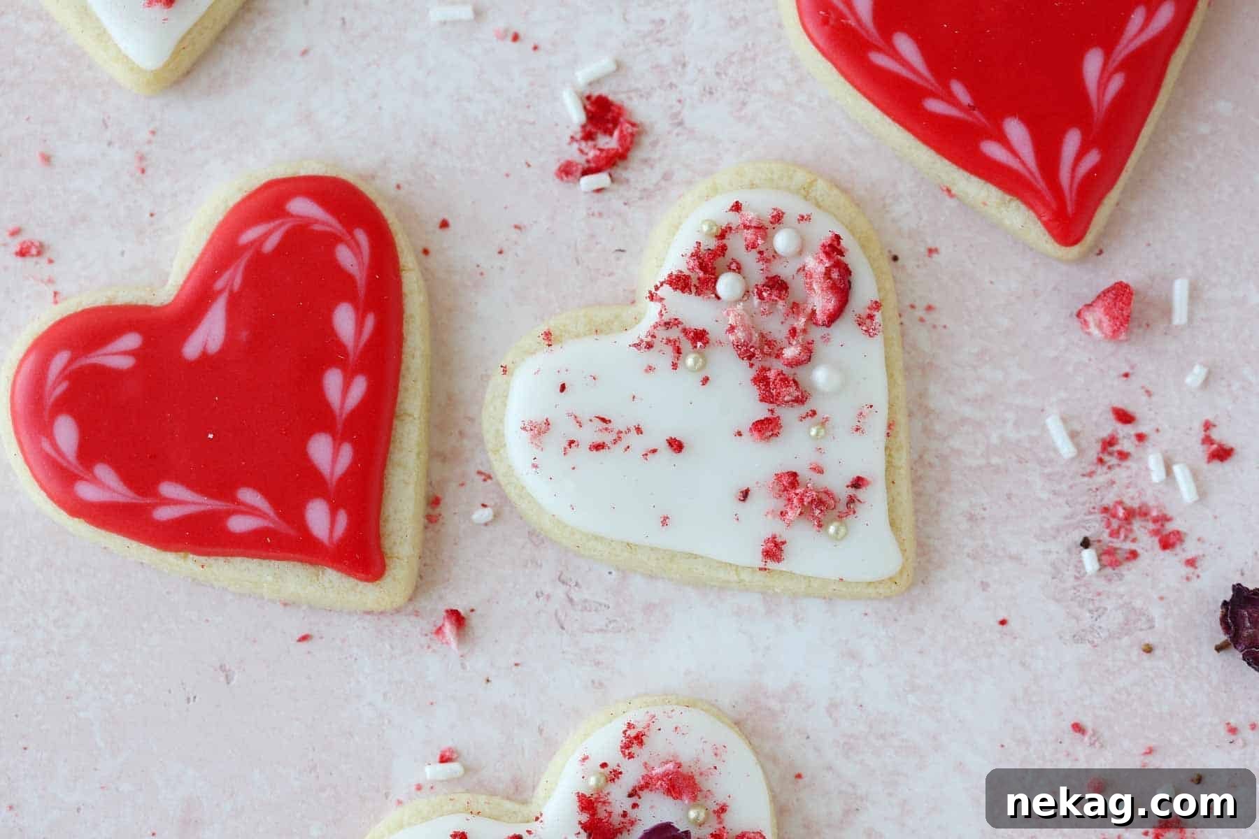 Sweetheart's Delight Cookies 20 A beautiful arrangement of red and white decorated heart-shaped sugar cookies, some with intricate patterns, perfect for a romantic gift.