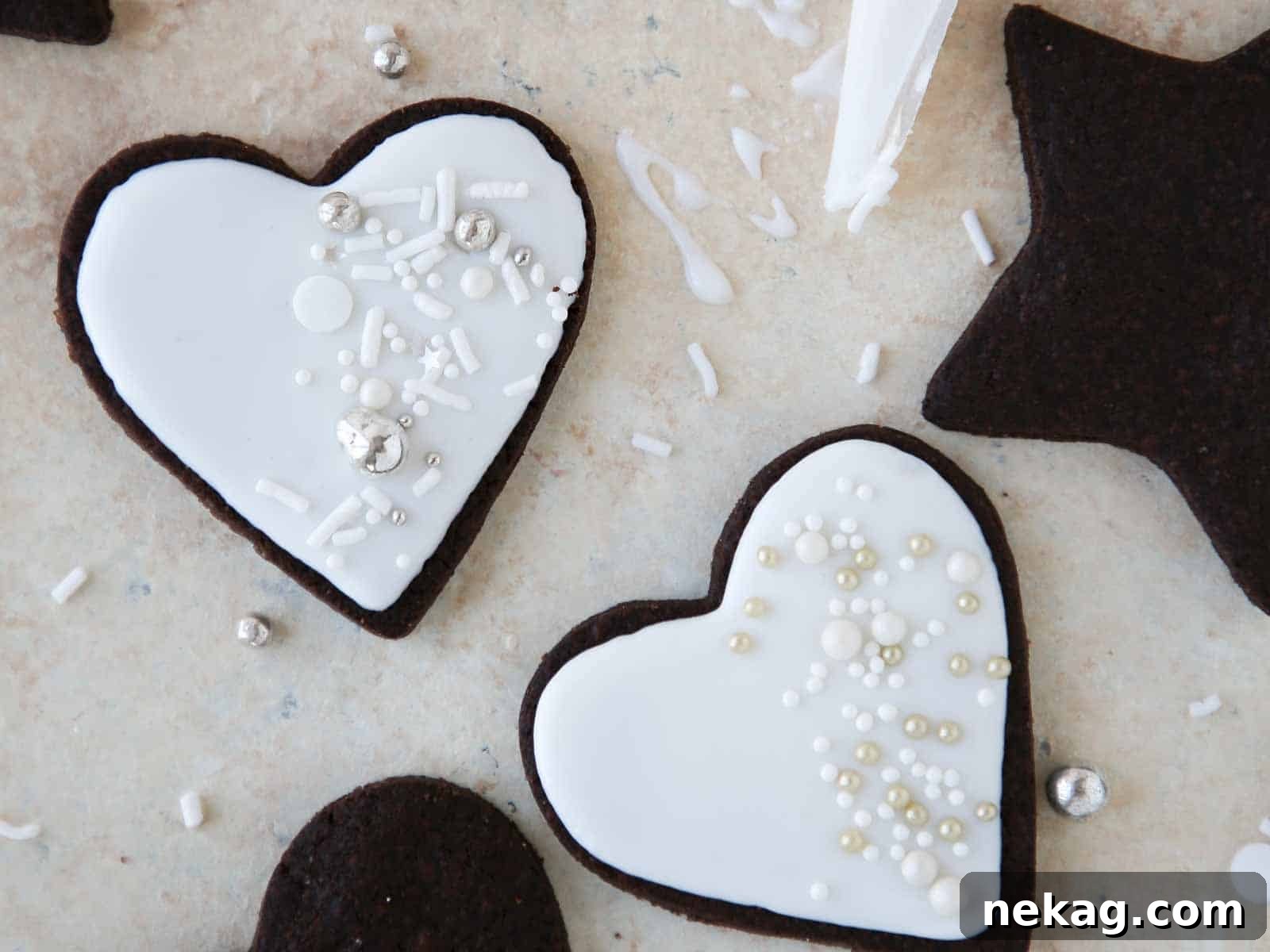 Rich Chocolate Sugar Cookies 3 Elegant white decorated heart sugar cookies, perfect for weddings or sophisticated events.