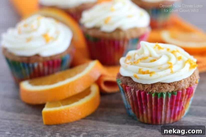 Freshly baked Coconut Carrot Cake Cupcakes on a cooling rack