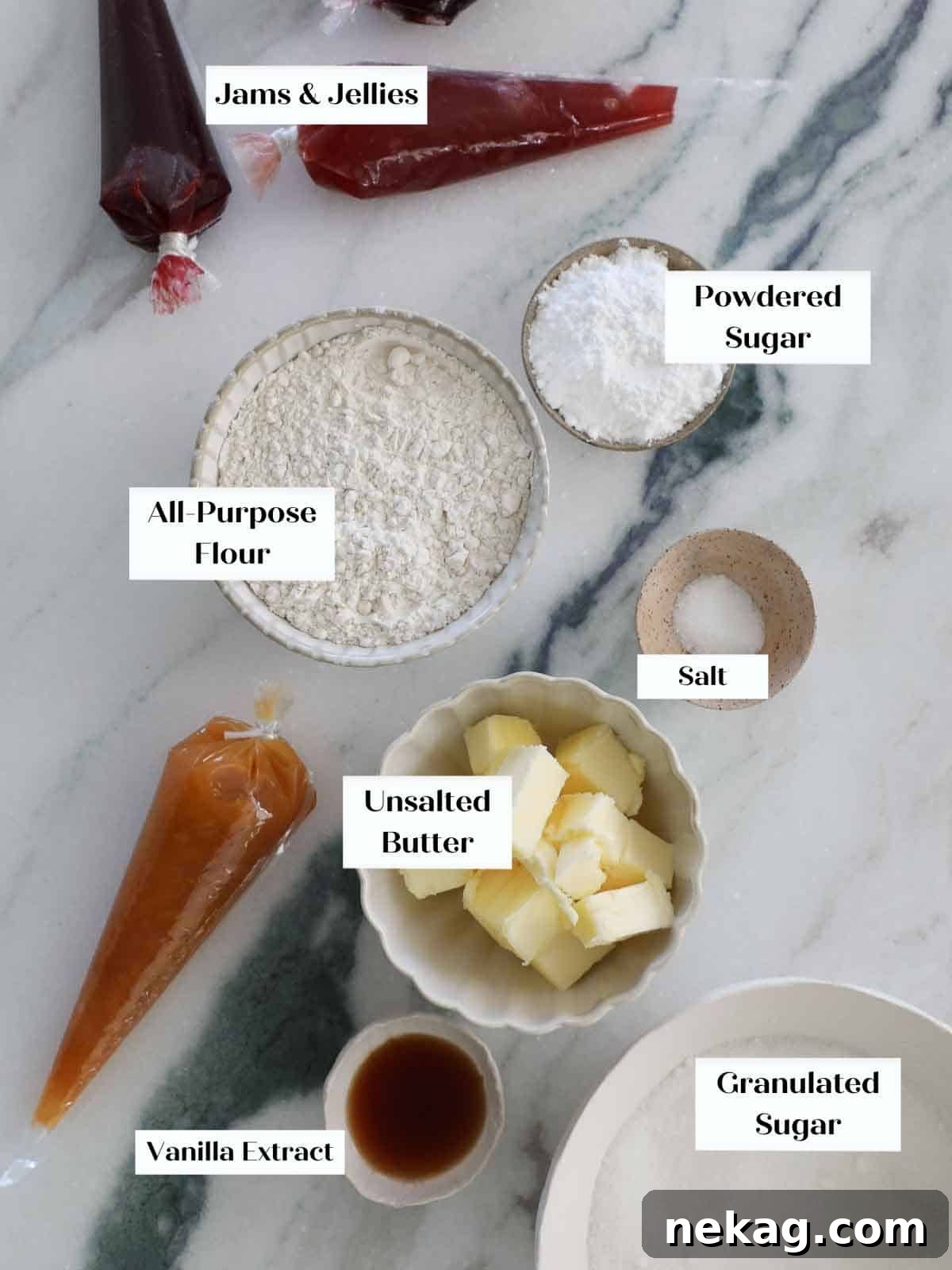 Preserve-Kissed Shortbreads 4 A flat lay photograph of all the vanilla thumbprint cookie ingredients laid out.