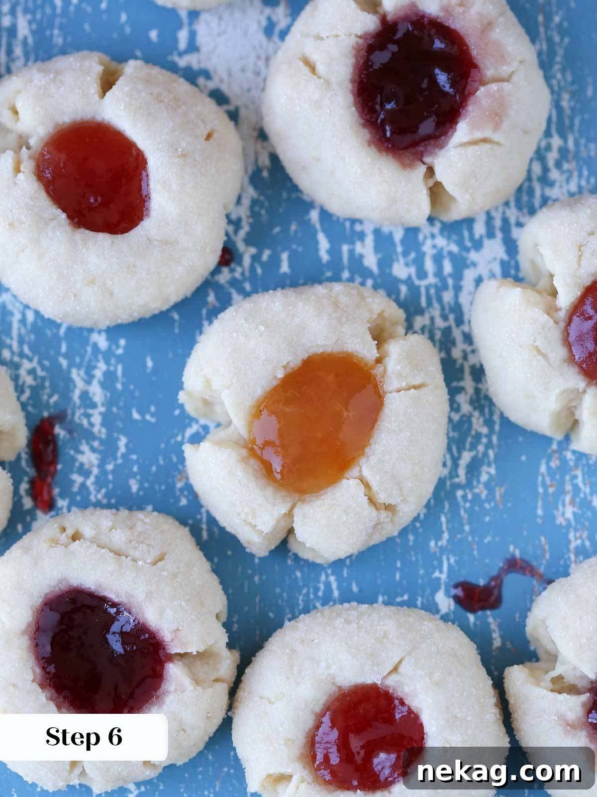 Preserve-Kissed Shortbreads 10 Freshly baked thumbprint cookies, cooling on a wire rack.