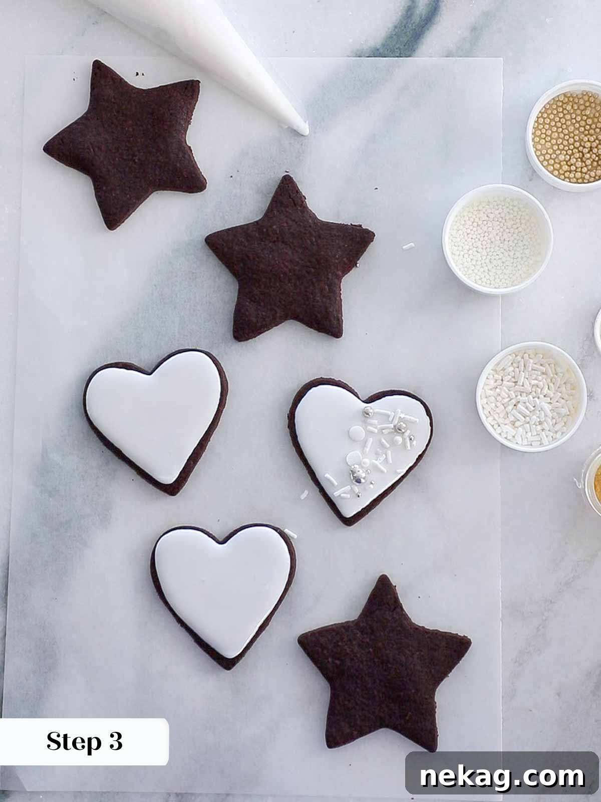A collection of beautifully decorated sugar cookies with various embellishments, showcasing the final result of the easy cookie icing.