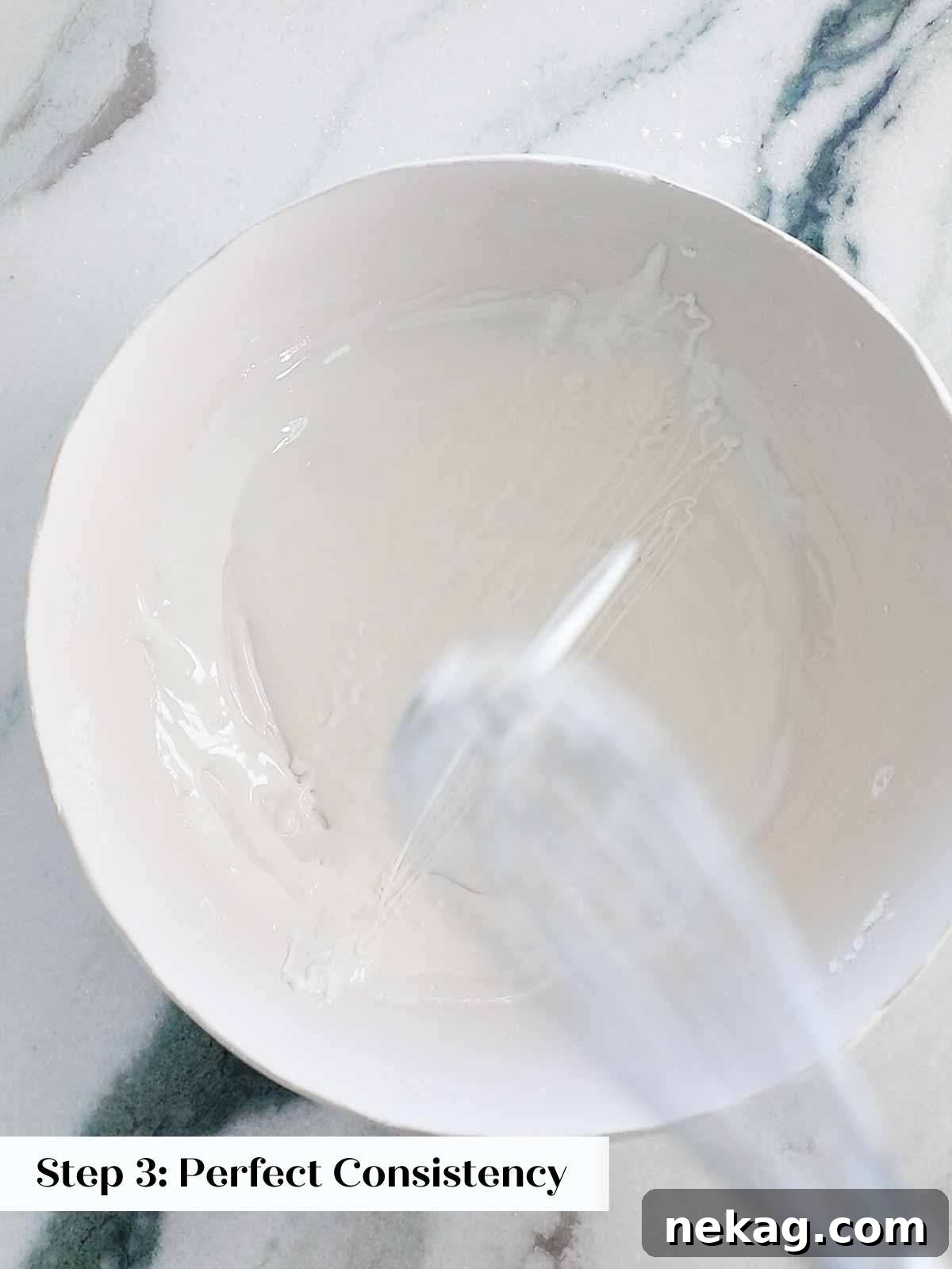 Image showing the perfect icing consistency for decorating sugar cookies, ideal for both outlining and flooding.