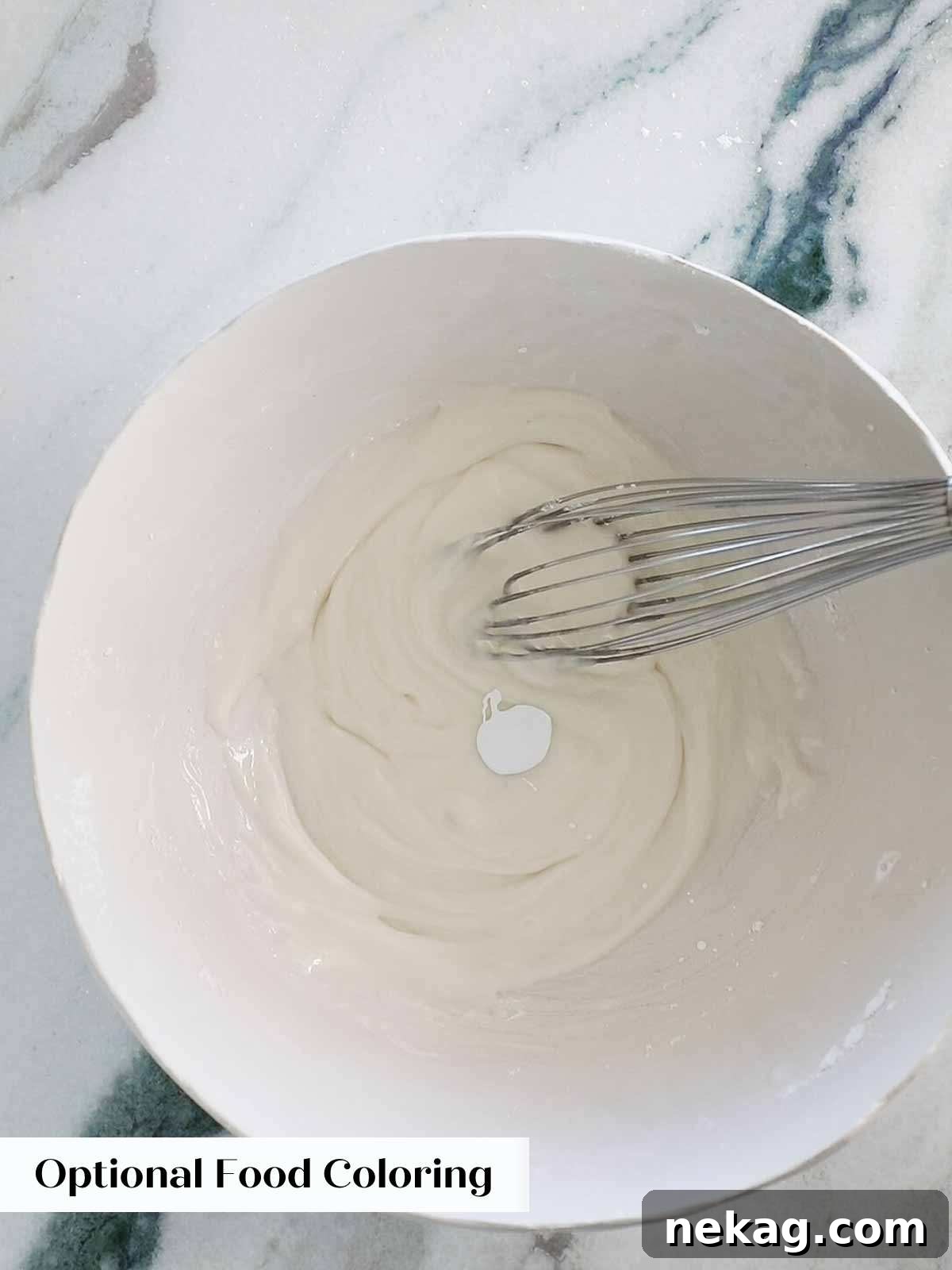 Adding white gel food coloring to white icing to achieve a more opaque and brilliant white.