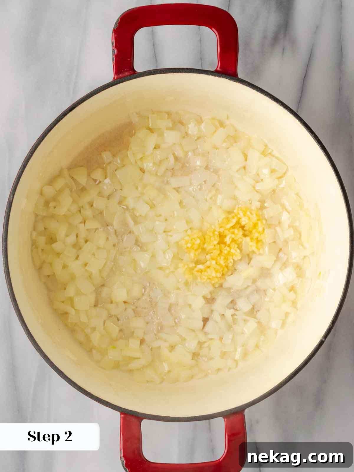 sweating onions and garlic in pot.