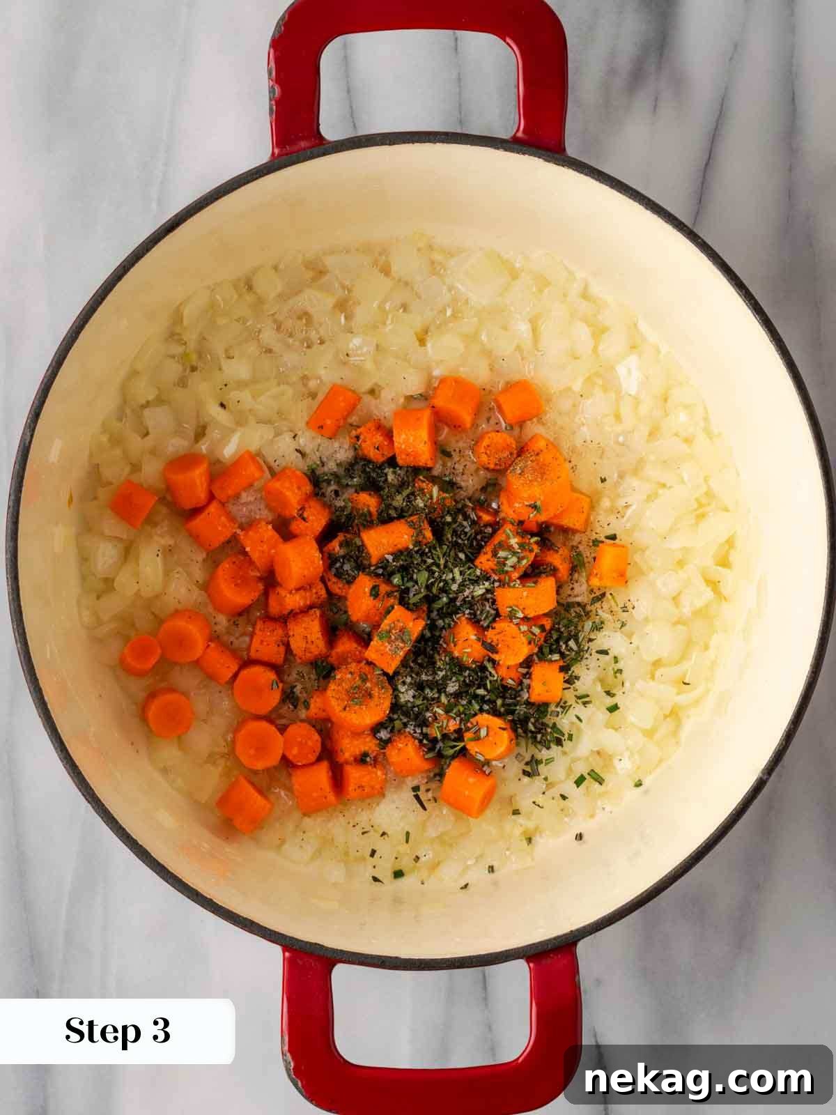 cooking vegetables in red pot.