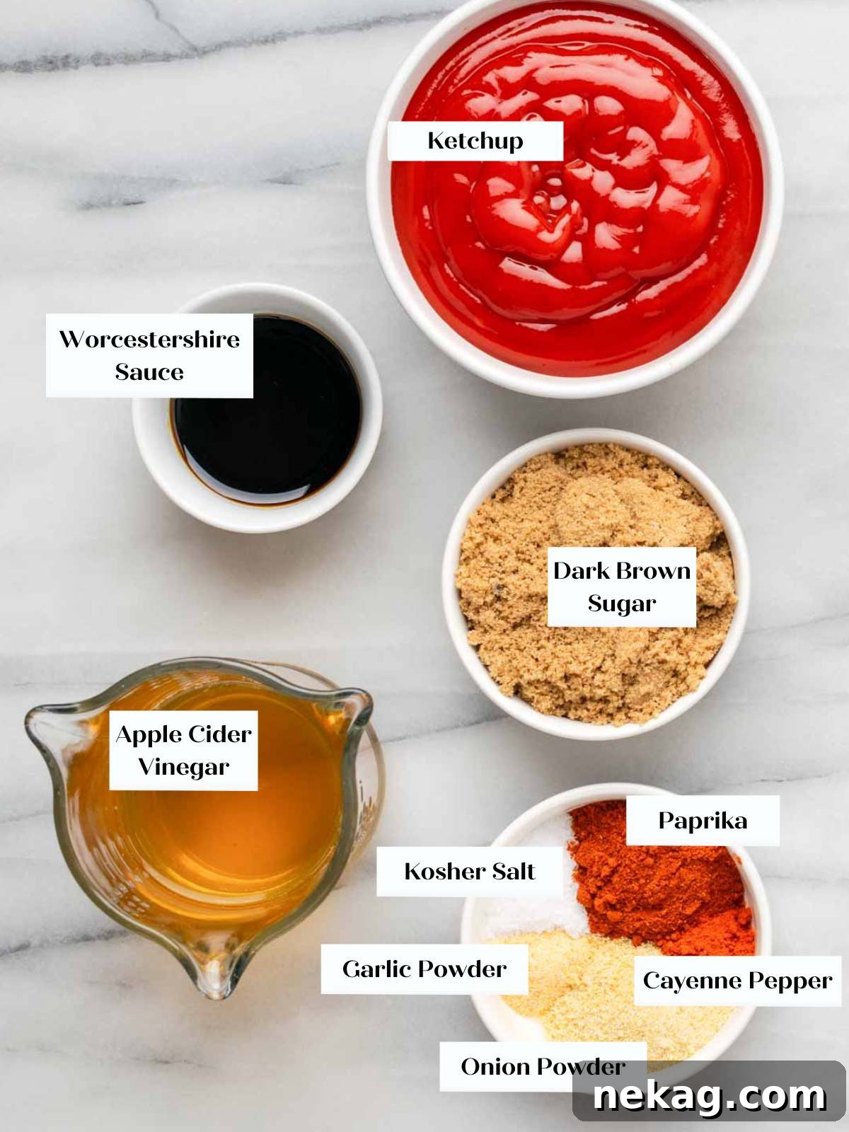 A flat lay photograph of all the ingredients needed to make homemade BBQ sauce, neatly arranged.