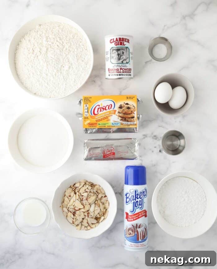 Ingredients needed to make almond bars with Crisco shortening.