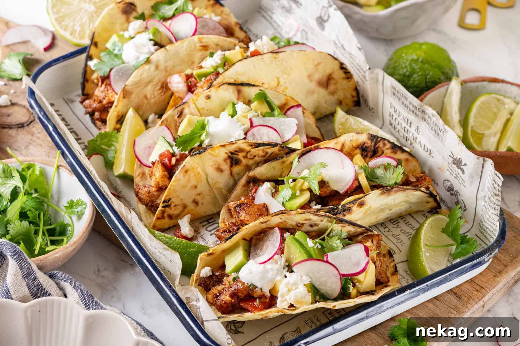 Zesty Chicken Taco Fiesta 14 A large platter of fresh chicken tacos and various vibrant toppings.