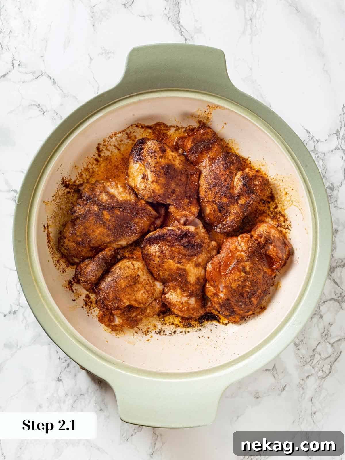 Zesty Chicken Taco Fiesta 8 Cooked chicken resting in the pan before chopping.