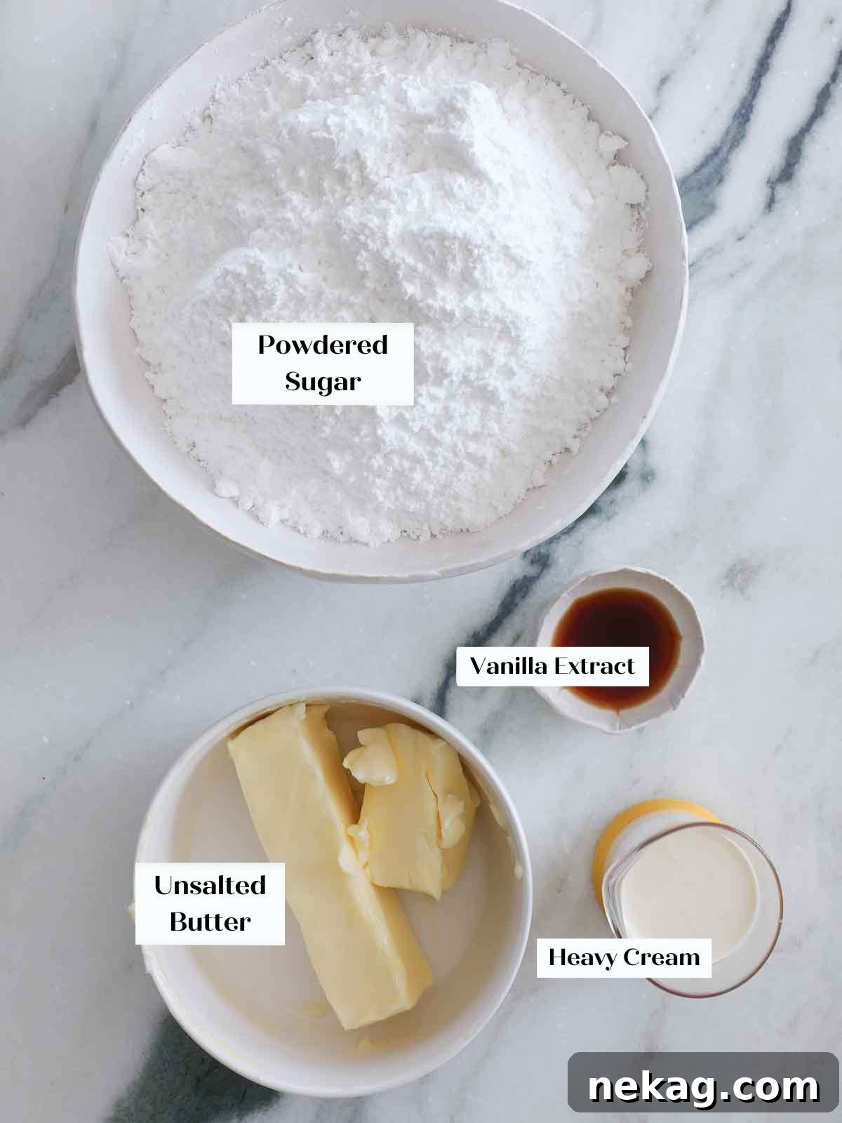 Perfectly Moist Vanilla Cake 6 american buttercream ingredients on marble.