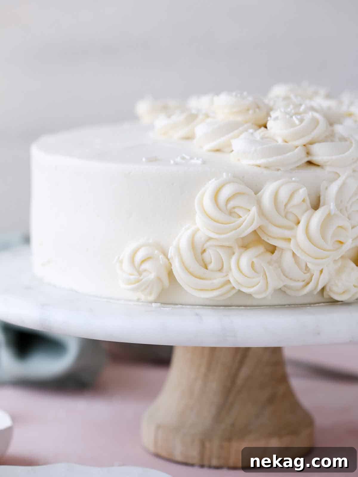 Perfectly Moist Vanilla Cake 7 vanilla cake on cake stand.