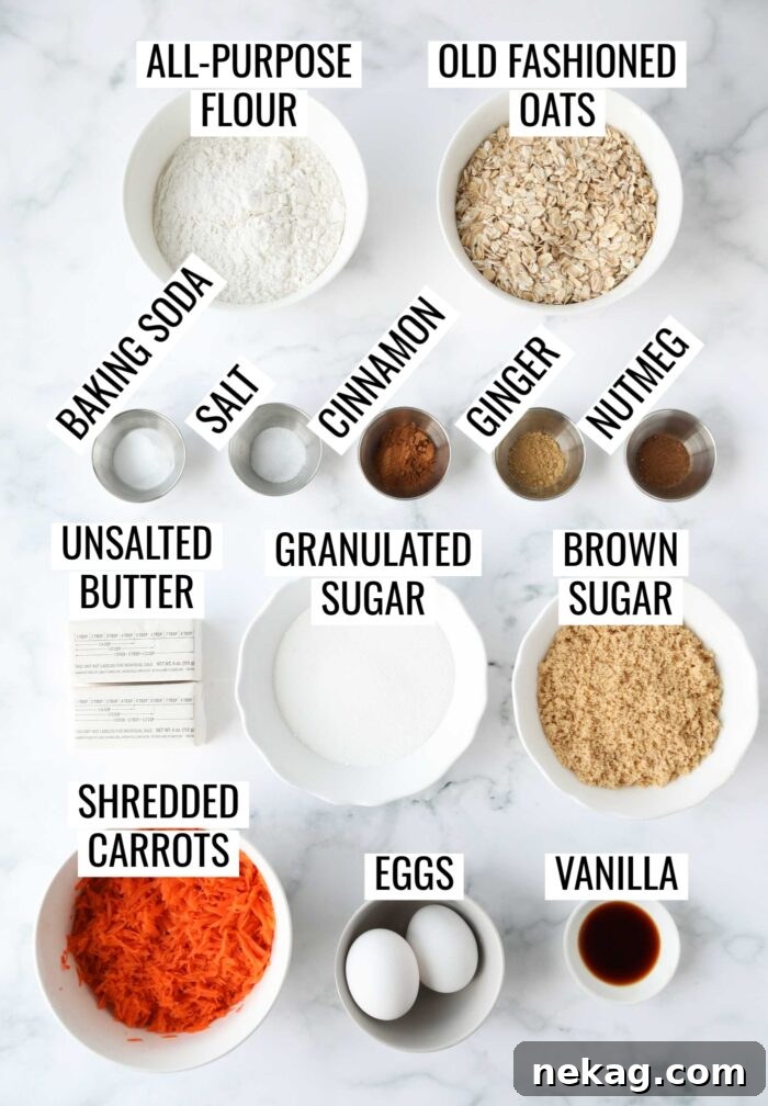 Creamy Carrot Spice Cookies 4 Labeled ingredients for making delicious carrot cake cookies. Flour, oats, spices, butter, sugars, eggs, vanilla, shredded carrots.